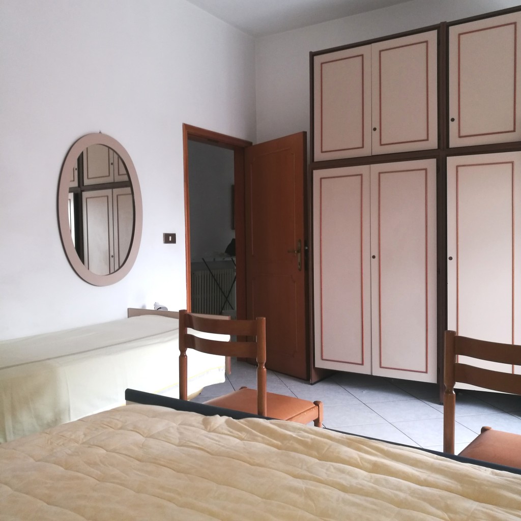 Camera da letto con quattro posti letto